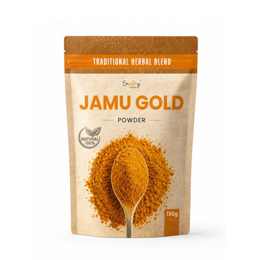 A stand-up pouch of Jamu Gold powder herbal blend, featuring a beige textured background, orange text, and a central graphic of a wooden spoon filled with orange-brown powder on a white studio background.