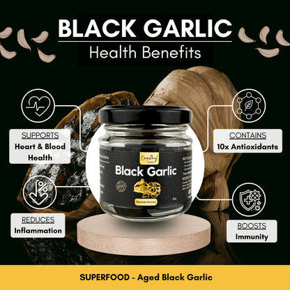 Jar of black garlic with health benefits displayed on a dark background