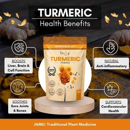 A stand-up pouch of Turmeric Powder by JAMU Traditional Plant Medicine is centered on a white circular pedestal against a dark, rustic background with ginger roots. The image includes marketing callouts highlighting health benefits: boosts liver, brain, and cell function; natural anti-inflammatory; soothes sore joints and bones; supports cardiovascular health.